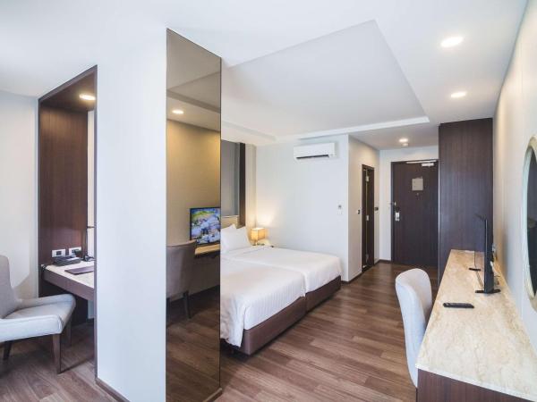 SureStay Plus by Best Western Sukhumvit 2 : photo 5 de la chambre chambre lits jumeaux deluxe