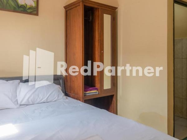 Vandhela Homestay Syariah Mitra RedDoorz : photo 1 de la chambre chambre double standard