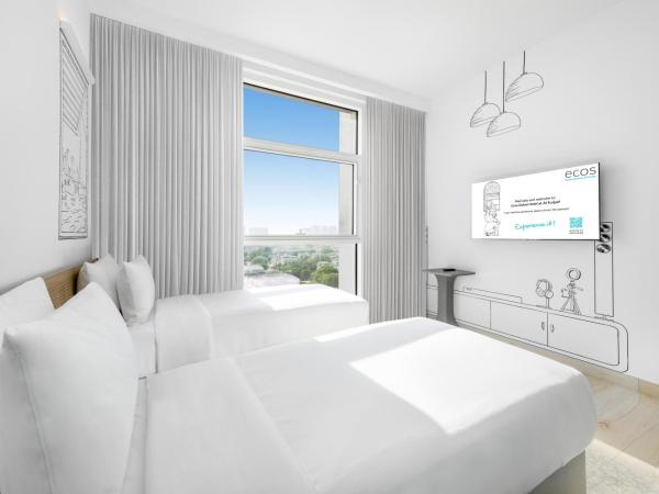 Ecos Dubai Hotel at Al Furjan : photo 1 de la chambre chambre lits jumeaux standard