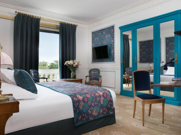 Hotel Le Negresco : photo 3 de la chambre chambre double exclusive avec vue sur le jardin et vue partielle sur la mer