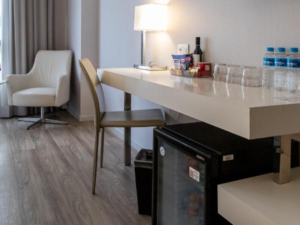 Radisson Rio de Janeiro Barra : photo 10 de la chambre chambre triple supérieure avec 3 lits simples