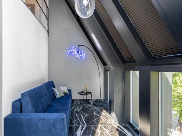 NEON APARTMENTS : photo 5 de la chambre appartement en duplex