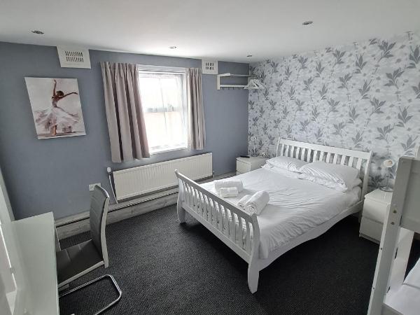 Queens Plaza Hotel : photo 1 de la chambre chambre quadruple