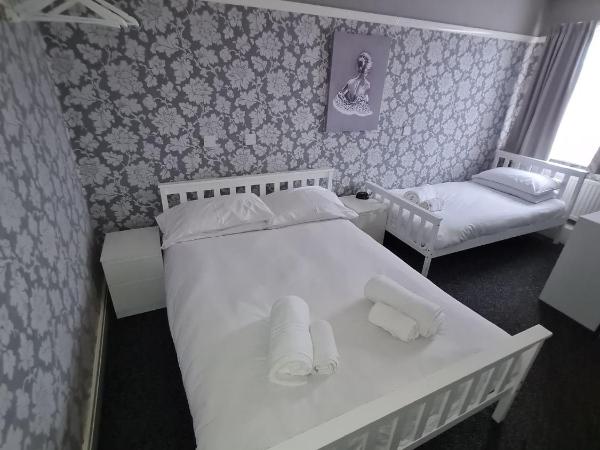 Queens Plaza Hotel : photo 1 de la chambre chambre triple