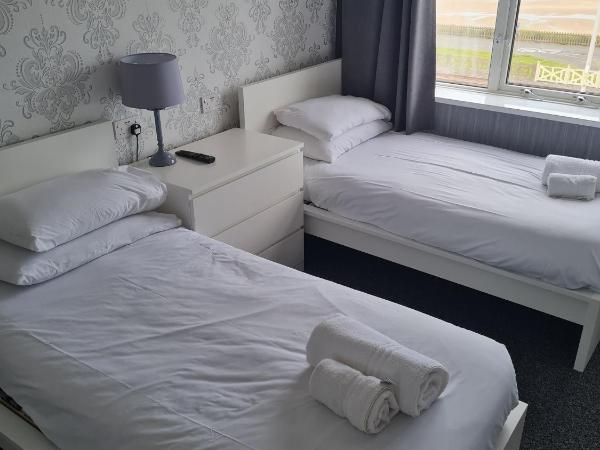 Queens Plaza Hotel : photo 3 de la chambre chambre lits jumeaux - vue sur mer