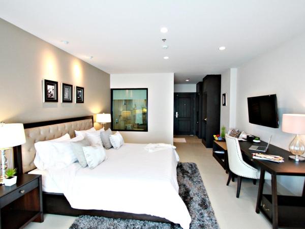 SN Plus Hotel - SHA Plus : photo 4 de la chambre chambre lit king-size avec balcon