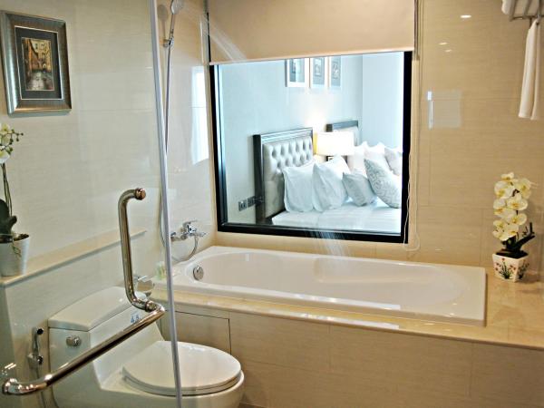 SN Plus Hotel - SHA Plus : photo 2 de la chambre chambre lits jumeaux avec baignoire