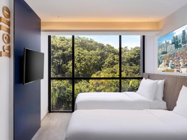 Travelodge Harbourfront Singapore : photo 4 de la chambre chambre lits jumeaux deluxe