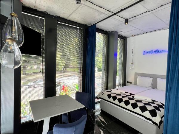 NEON APARTMENTS : photo 2 de la chambre appartement deluxe