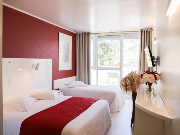 Les Alcyons : photo 1 de la chambre chambre triple - premier Étage