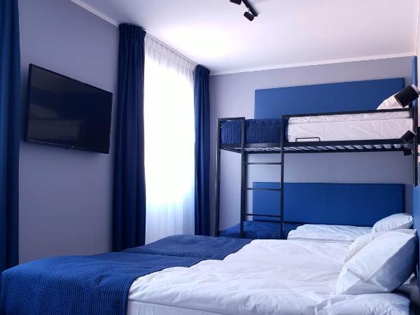 Hostel Annamarie : photo 1 de la chambre chambre quadruple avec salle de bains commune