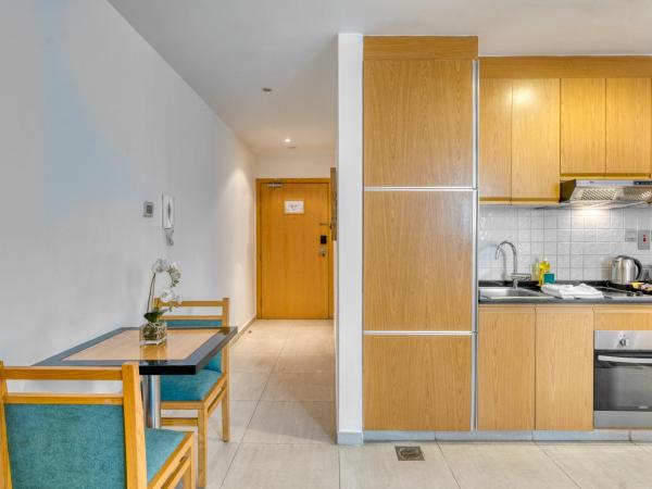 Grand Heights Hotel Apartments : photo 3 de la chambre studio classique