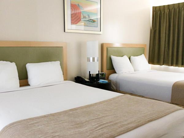 Beach Place Hotel : photo 10 de la chambre chambre double supérieure avec 2 lits doubles et cuisine - parking gratuit