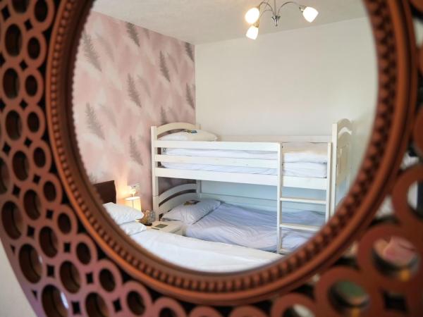 Bella Vista Lodge : photo 3 de la chambre chambre familiale avec salle de bains privative