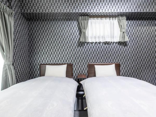 Tabist Kyogura Kyoto Nijo : photo 4 de la chambre chambre lits jumeaux standard - non-fumeurs