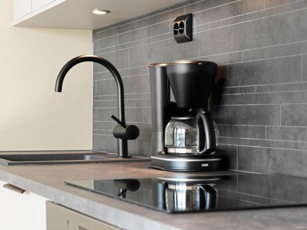 Bjørvika Apartments - Sirkus Renaa : photo 10 de la chambre hébergement 1 chambre avec canapé-lit