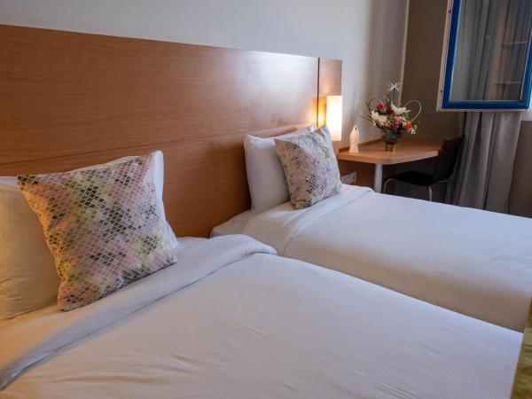 Hôtel La Perle de Mogador : photo 1 de la chambre chambre lits jumeaux - vue sur piscine