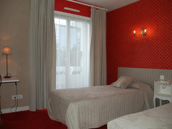 Hôtel de L'Avenue : photo 3 de la chambre chambre lits jumeaux