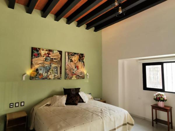 LARIMAR Gallery y Hotel Boutique : photo 6 de la chambre chambre lit king-size supérieure