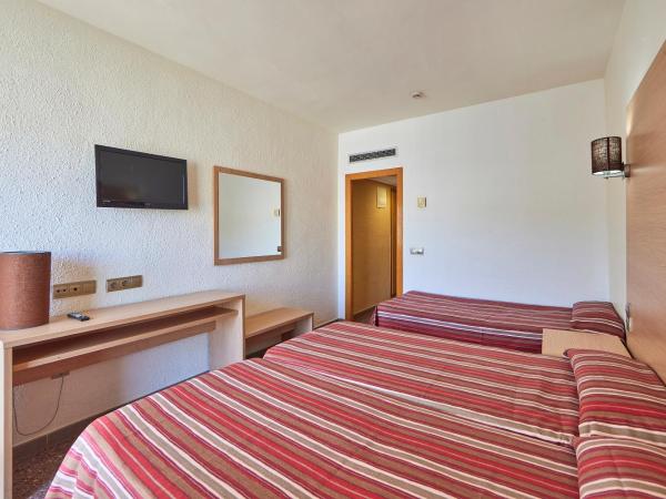 Don Juan Resort Affiliated by FERGUS : photo 1 de la chambre chambre lits jumeaux