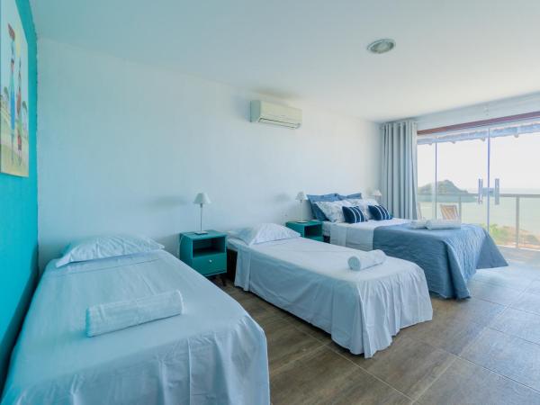 Morada do Sol Guest House 2 : photo 6 de la chambre chambre quadruple - vue sur mer