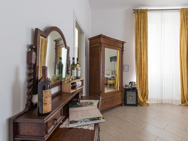 Gourmet B&B Villa Landucci : photo 7 de la chambre chambre deluxe double ou lits jumeaux