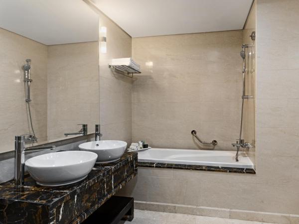 Wyndham Residences The Palm : photo 2 de la chambre appartement 1 chambre avec accès à la plage privée