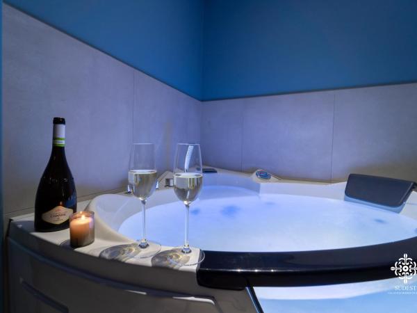 Matteotti Luxury Residence : photo 10 de la chambre appartement supérieur avec jacuzzi