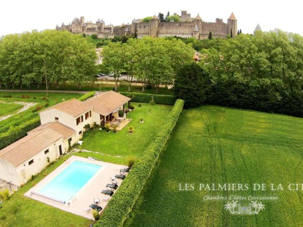 Chambres d'hôtes Les Palmiers de la Cité : photo 7 de la chambre chambre double avec baignoire et douche