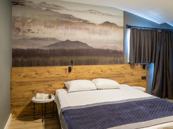 Pure Blanche Hotel : photo 1 de la chambre chambre familiale - vue latérale sur mer