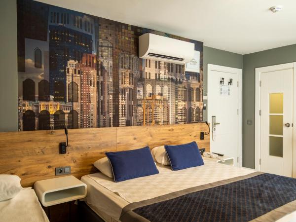 Pure Blanche Hotel : photo 1 de la chambre chambre triple deluxe - vue sur mer