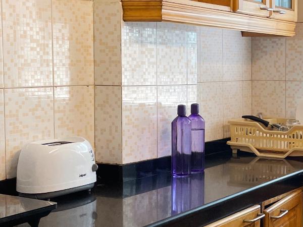 The Aster Homestay - Bedrooms & Apartments : photo 5 de la chambre appartement avec balcon