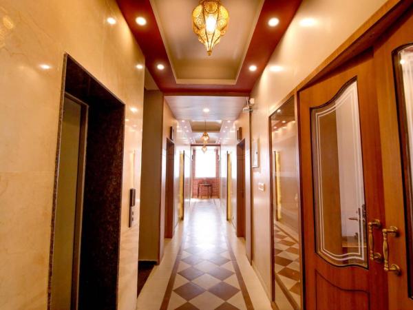 Gems Suites-A Boutique Stay : photo 7 de la chambre chambre double deluxe avec balcon