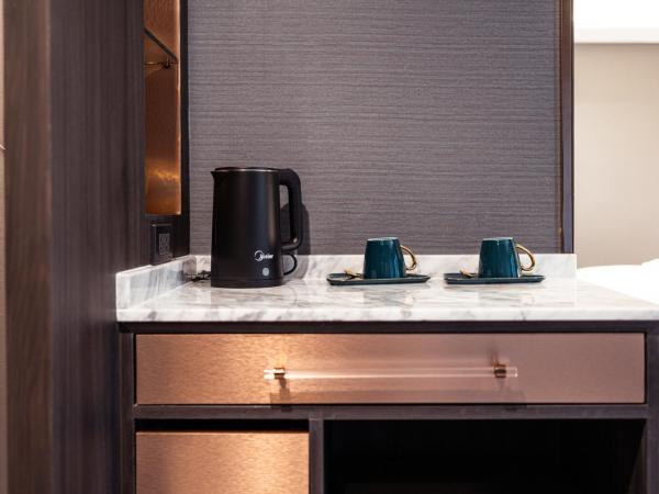 The One Smart Living : photo 9 de la chambre chambre deluxe double ou lits jumeaux