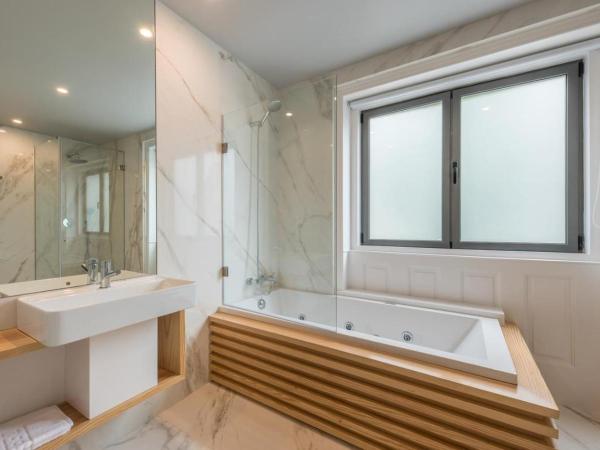 Serenata Boutique Rooms : photo 5 de la chambre suite deluxe avec baignoire spa