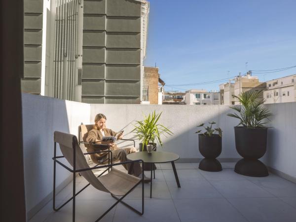 YOURS boutique stay : photo 5 de la chambre appartement avec terrasse