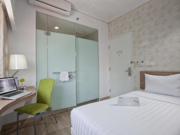 Whiz Hotel Cikini Jakarta : photo 4 de la chambre chambre double ou lits jumeaux standard