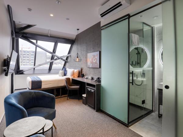 Microtel by Wyndham Wellington : photo 8 de la chambre chambre affaires lit queen-size