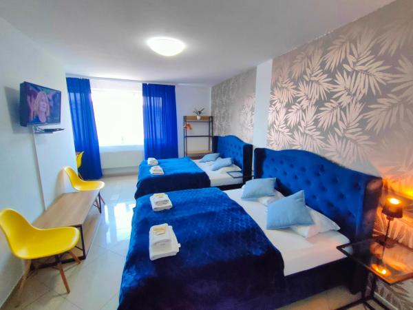 Great Polonia Wrocław City Center : photo 4 de la chambre chambre familiale