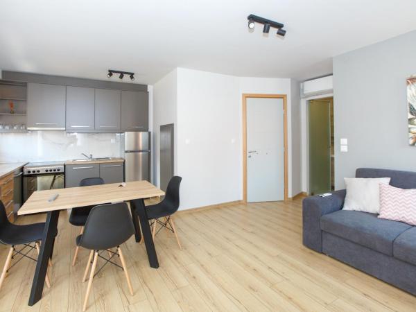 ΟNIRO Comfort Living : photo 4 de la chambre chambre quadruple avec salle de bains privative