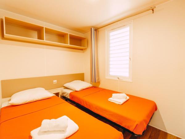 Village Vacances Le Parc Des Chênes (by Popinns) : photo 8 de la chambre mobile home - 6 personnes