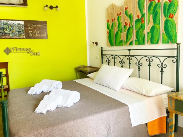 La Firenze del Sud : photo 2 de la chambre chambre lit king-size - vue sur jardin