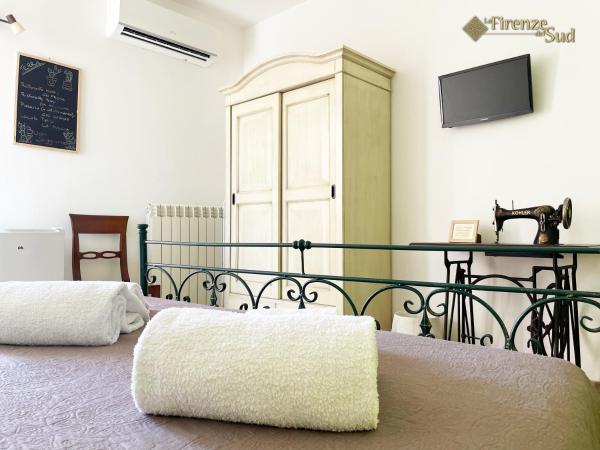 La Firenze del Sud : photo 4 de la chambre chambre lit king-size - vue sur jardin
