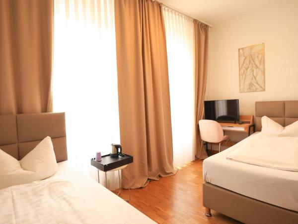 TM Hotel Düsseldorf : photo 6 de la chambre chambre lits jumeaux Économique