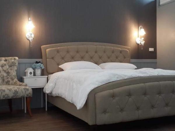 Baan JaoKorKluay บ้านเจ้ากอกล้วย : photo 5 de la chambre chambre lit king-size - vue sur jardin