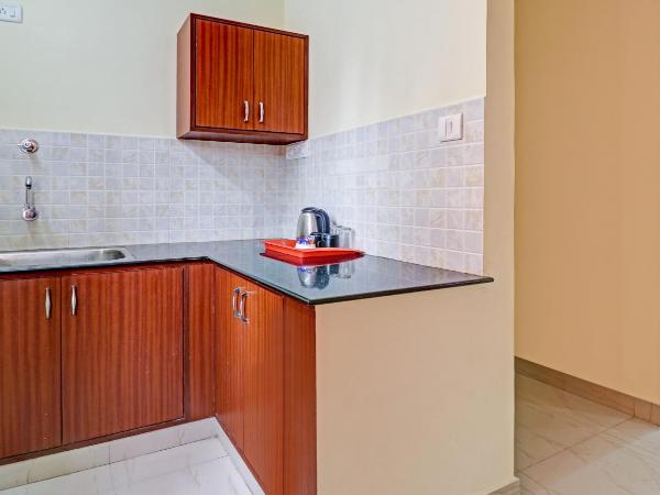 Treebo Akshaya Mayflower Vijaya Bank Layout : photo 7 de la chambre [sanitized] premium double room