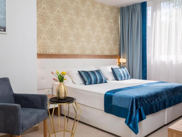 Hotel Corner : photo 3 de la chambre chambre familiale - vue sur ville 