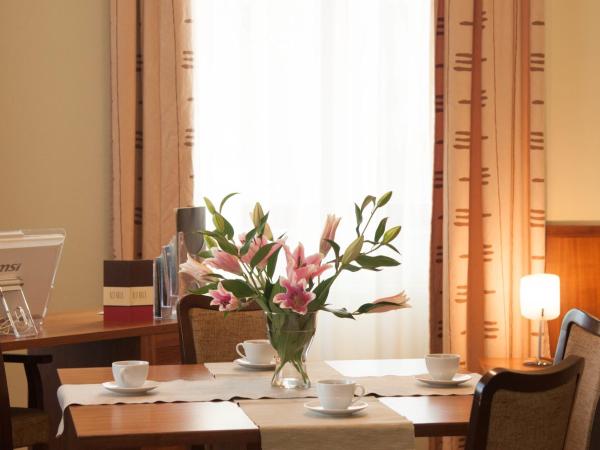 Red Brick Apartments : photo 6 de la chambre appartement deluxe