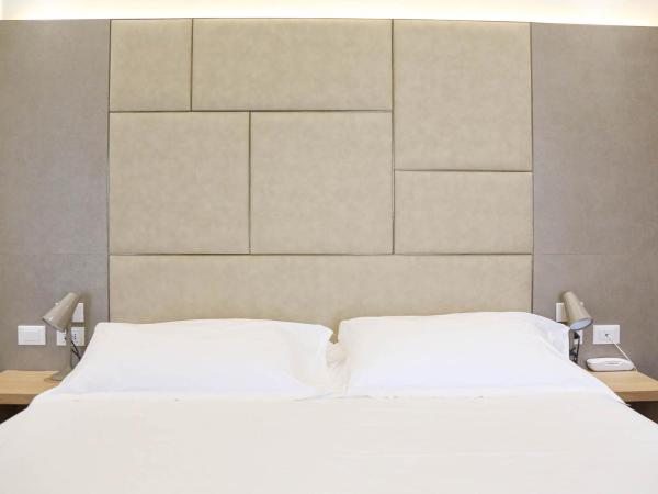 Hotel Polo : photo 2 de la chambre chambre familiale avec balcon