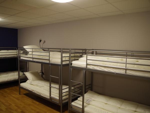 Spoton Hostel & Sportsbar : photo 1 de la chambre chambre familiale avec salle de bains commune (sans fenêtre)